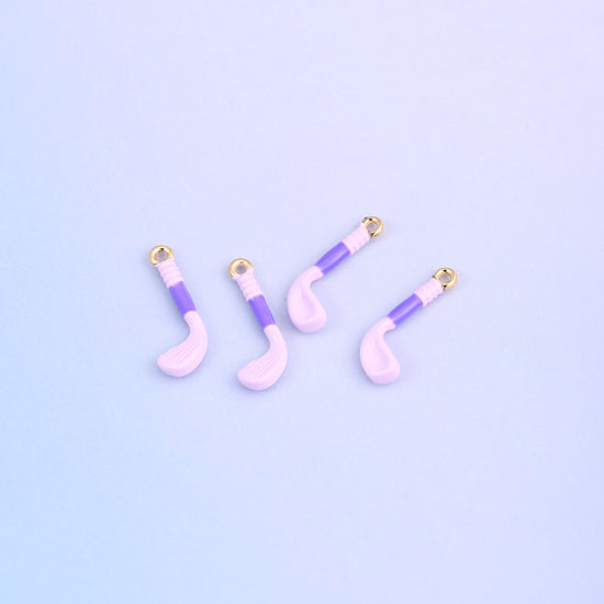 Four light purple golf club charms with purple enamel grips.