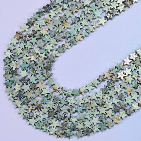 African Howlite Flat Star Beads 6mm, 15 inch strand