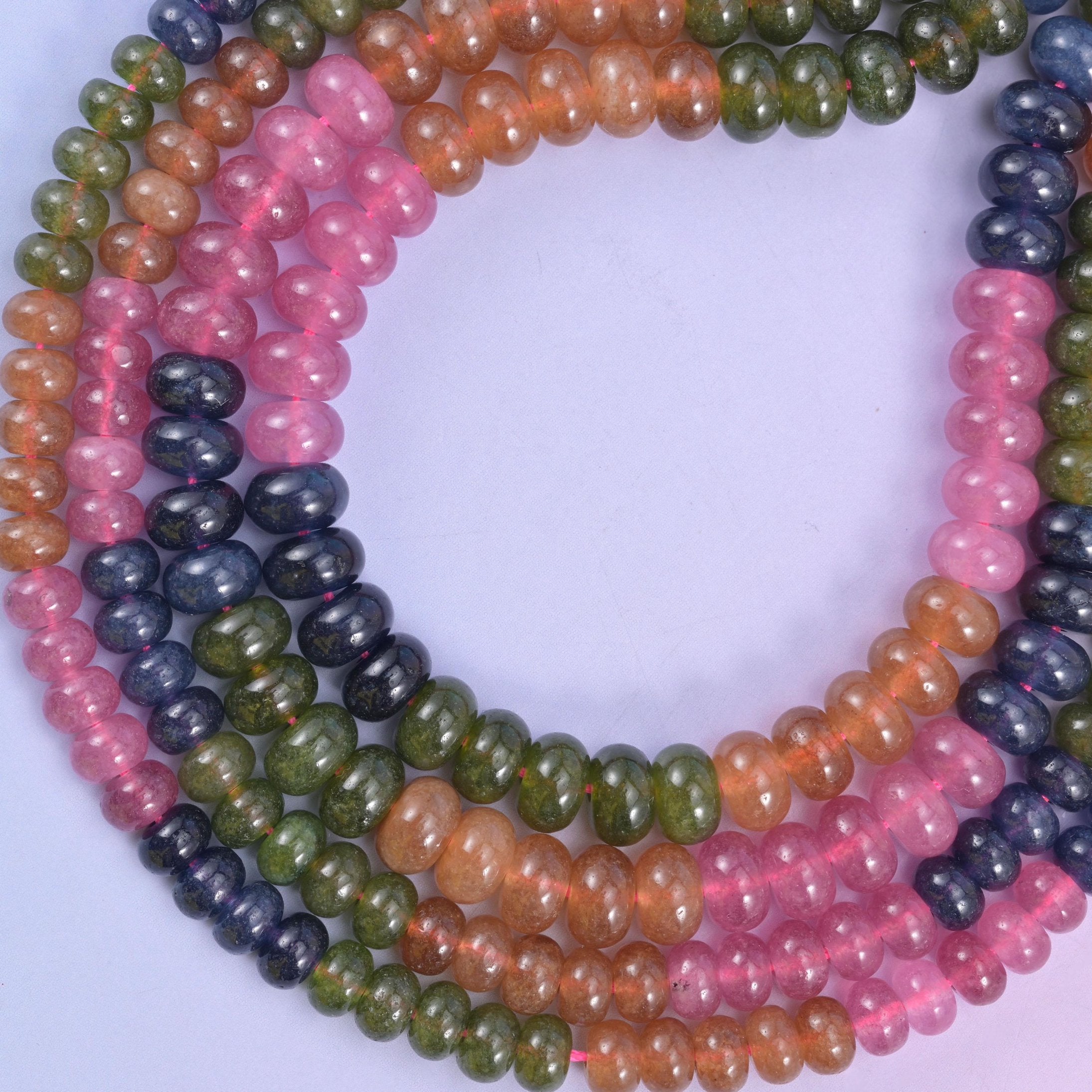 Tourmaline color dyed jade rondelle beads, approximately 75 to 88 beads per strand