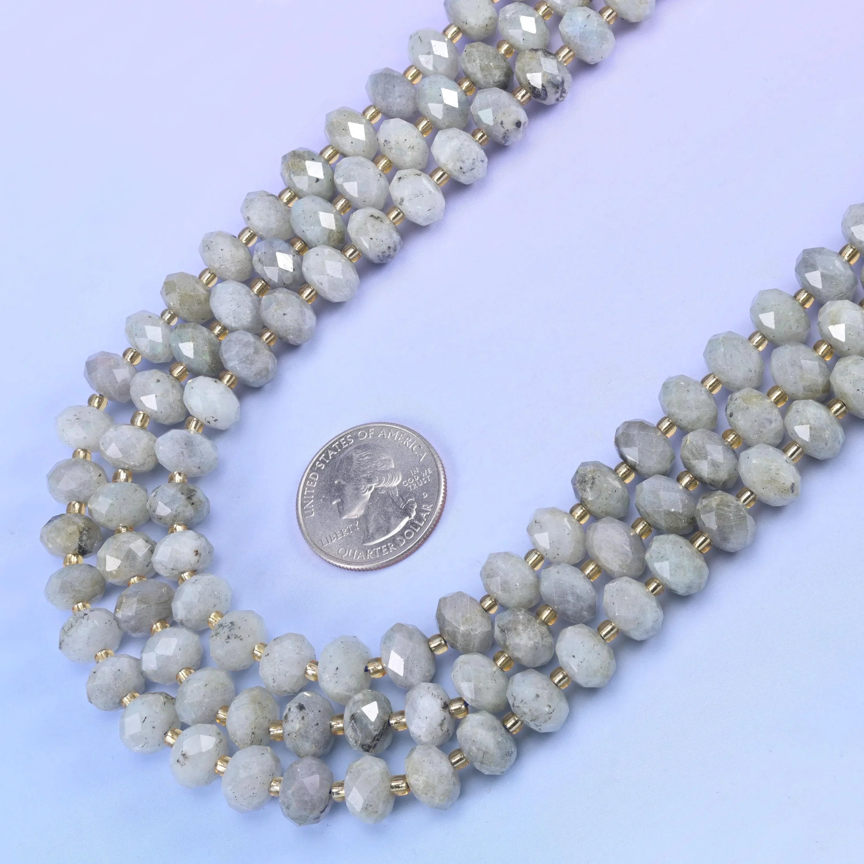 White Labradorite Faceted Rondelle Beads in pale grey-white with a silvery sheen