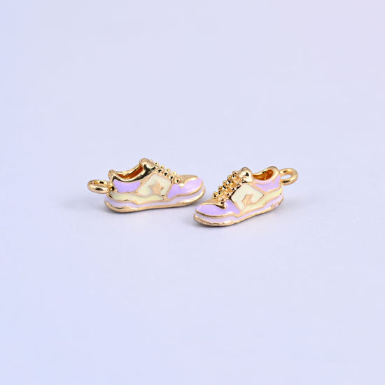 Two light purple sneaker charms angled to show the 4.45mm thick molded shoe.