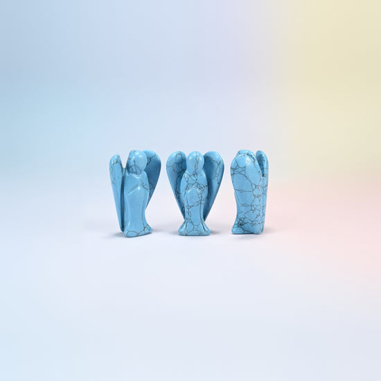 Three dyed blue howlite guardian angel carvings, turquoise blue with dark veins, 2 inch