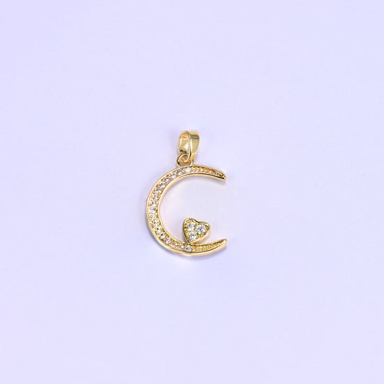 18K gold plated moon heart zirconia charm shown on its own, the crescent lined with clear pave and a heart tucked inside the curve.
