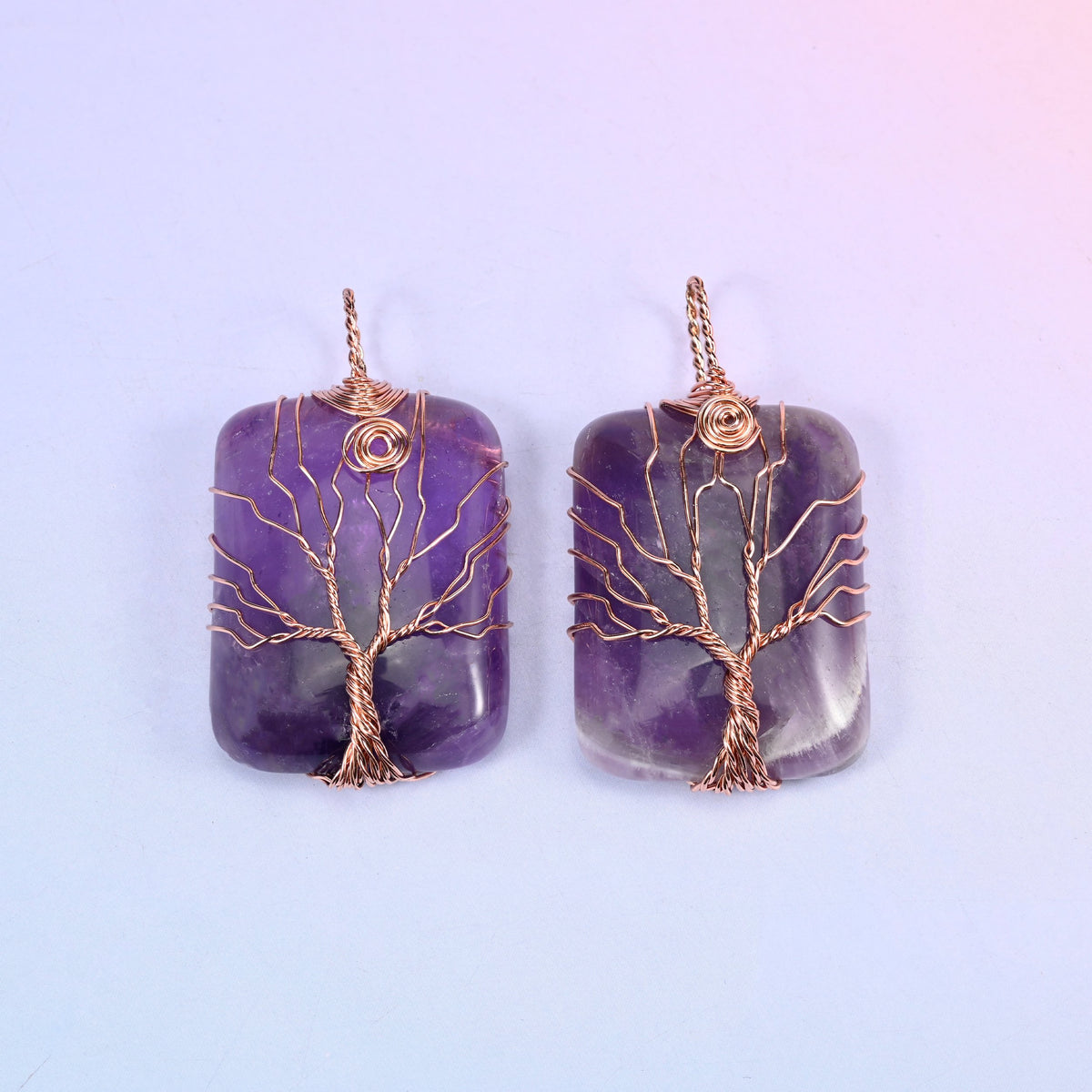 Rectangle Gemstone Tree of Life Pendant in deep purple amethyst, a pair with the darker purple banding visible through the copper wire tree.
