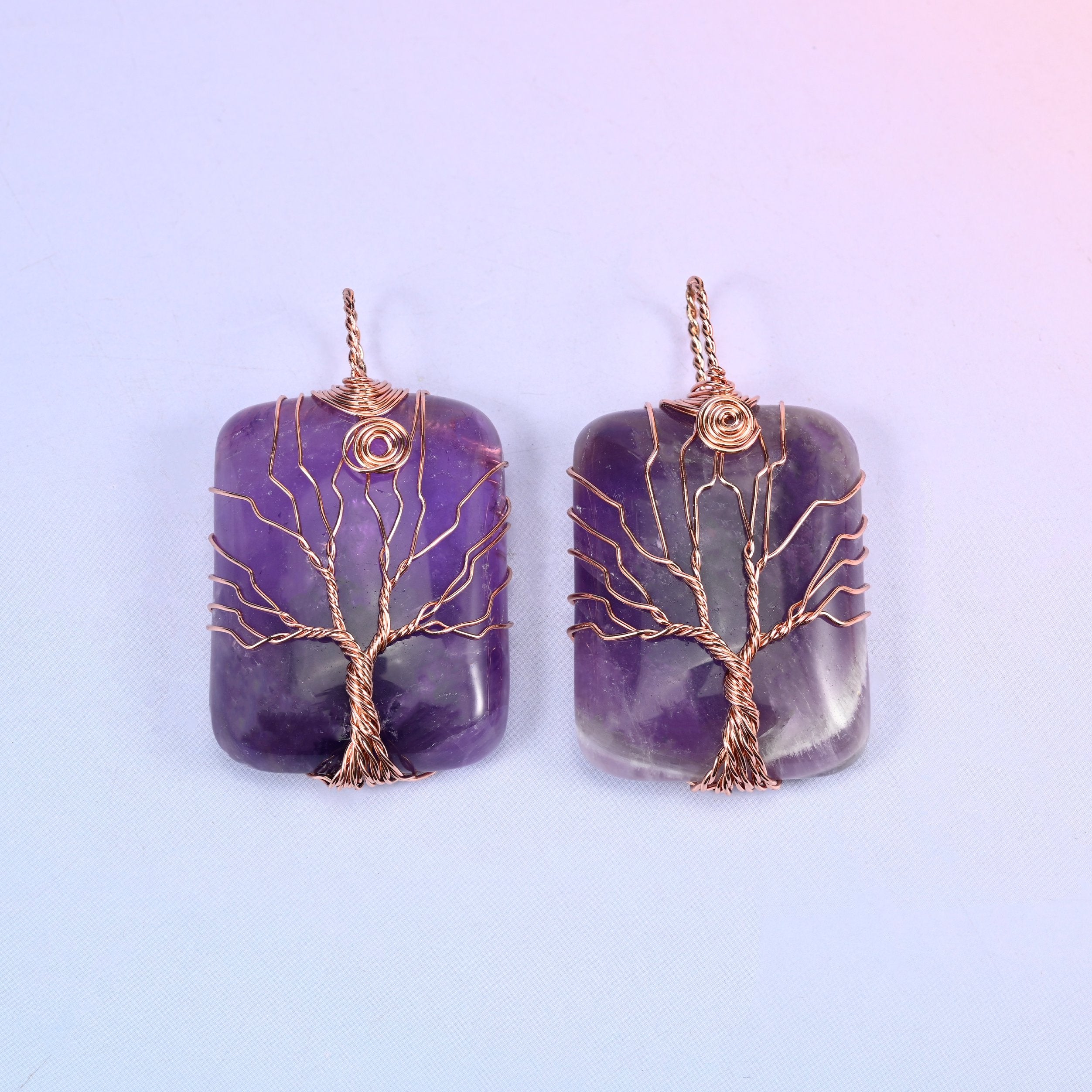 Rectangle Gemstone Tree of Life Pendant in deep purple amethyst, a pair with the darker purple banding visible through the copper wire tree.