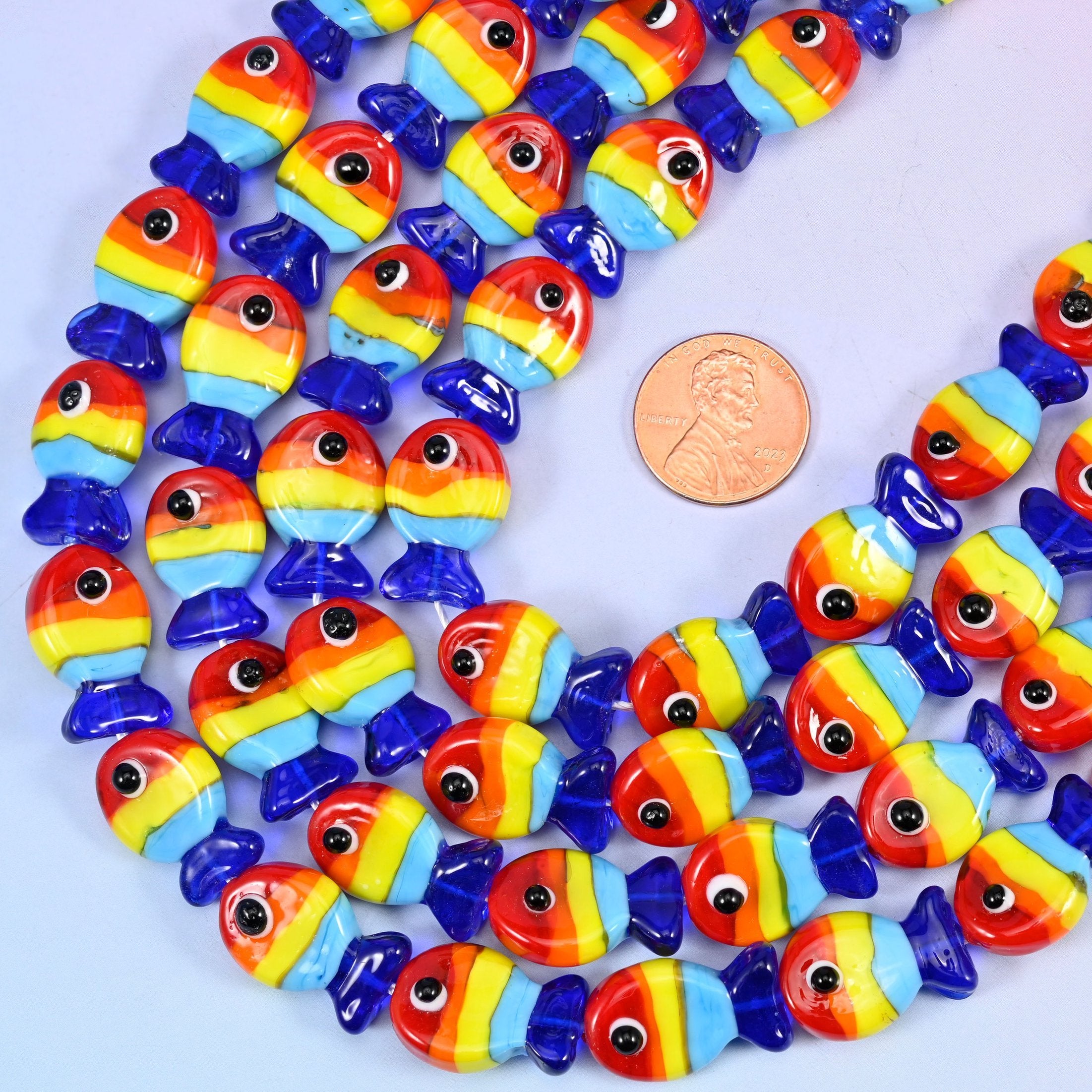 Fish cut glass beads