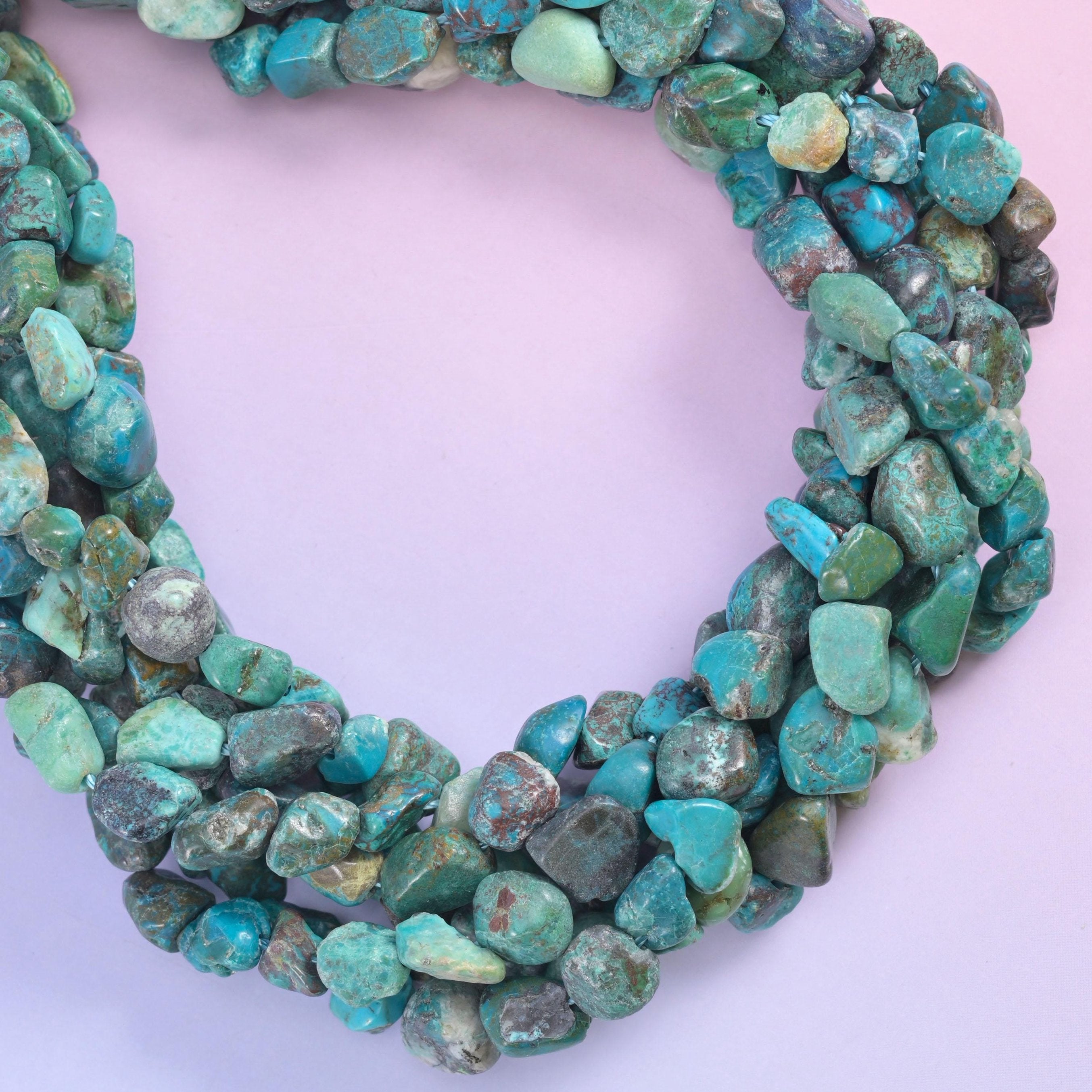 Open loop of nuggets viewed from above, each bead cut to its own uneven shape