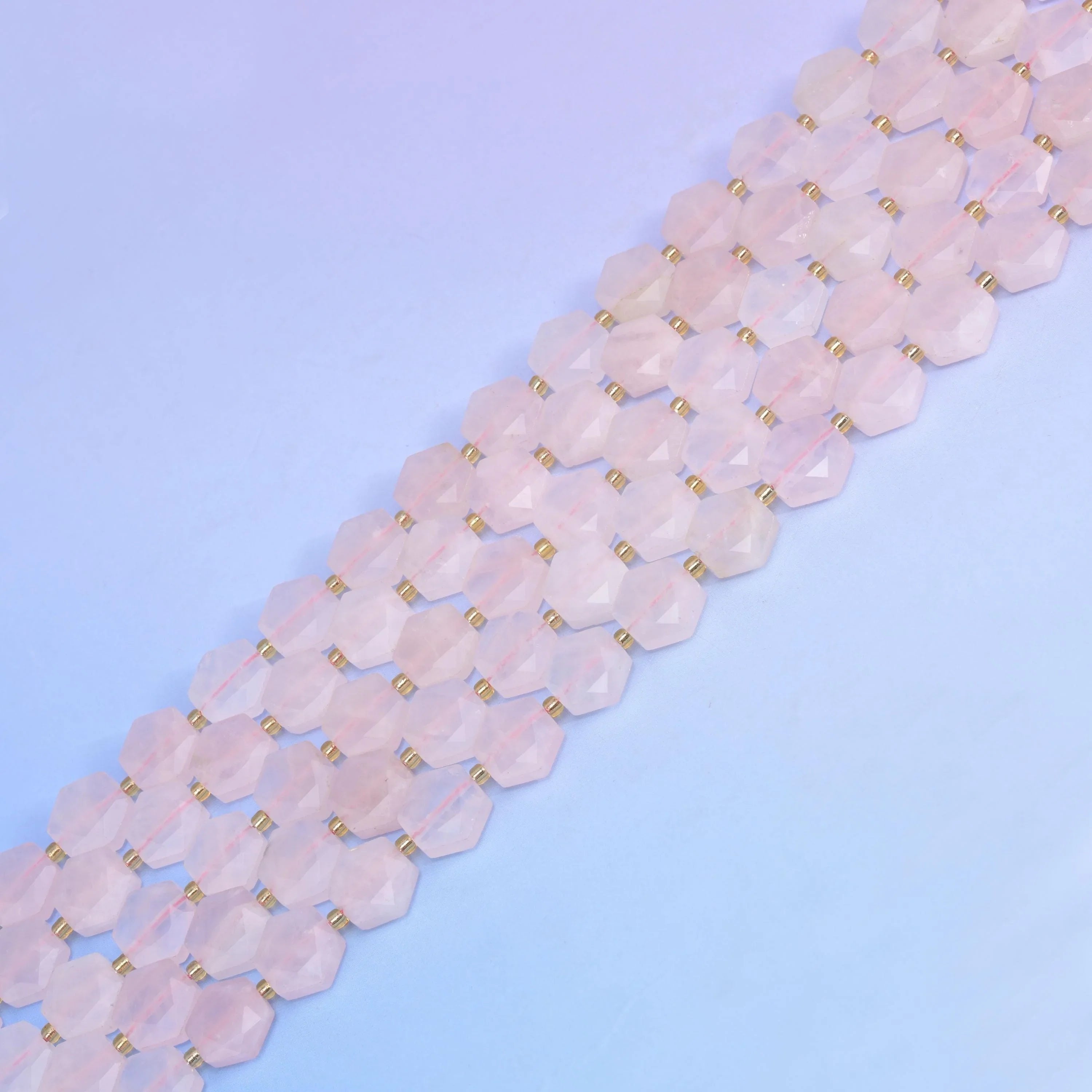 Rose Quartz in pale blush pink with soft translucency.