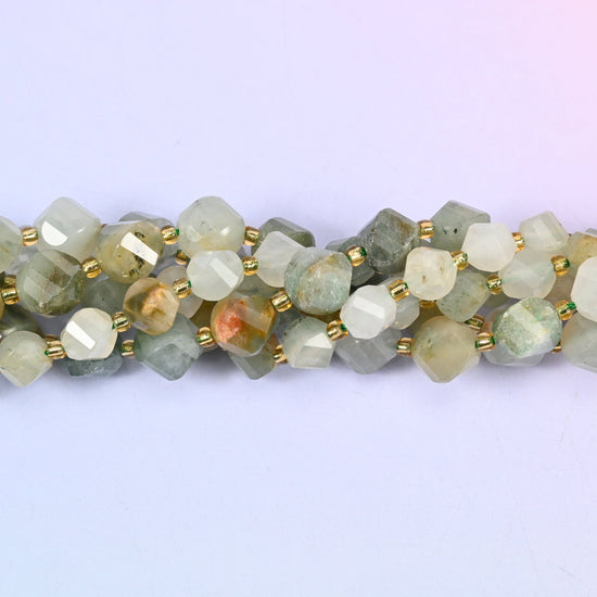 Green Grass Silk Stone Faceted Spiral Twist Beads, muted sage green threaded with cream and straw, with fine fibrous streaks