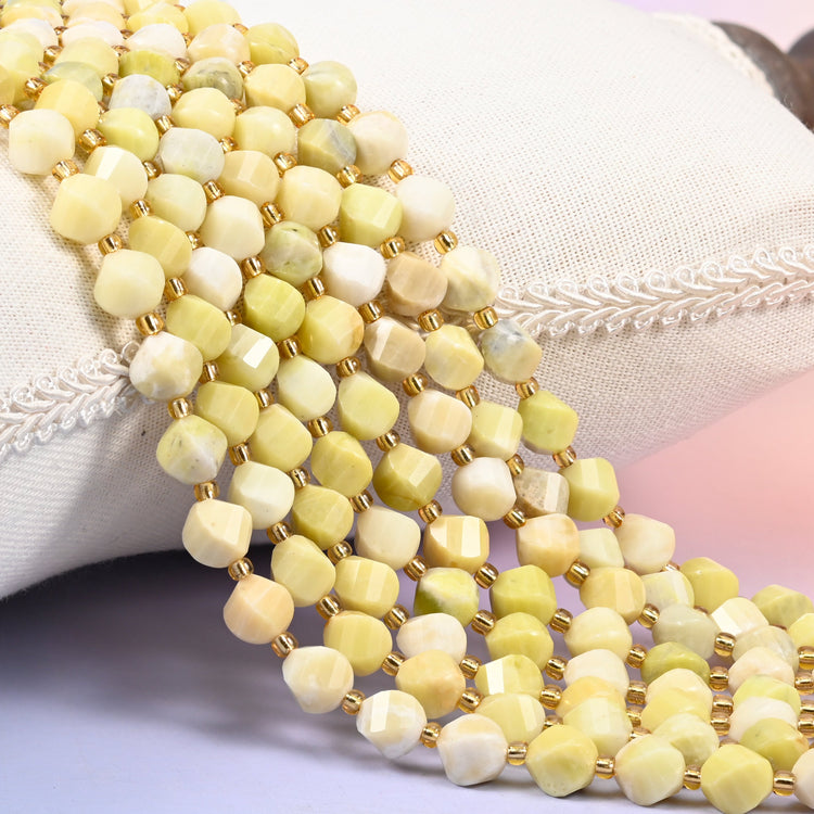 Lemon Jade yellow jade beads, 8mm faceted spiral twist, soft lemon and cream with a waxy sheen