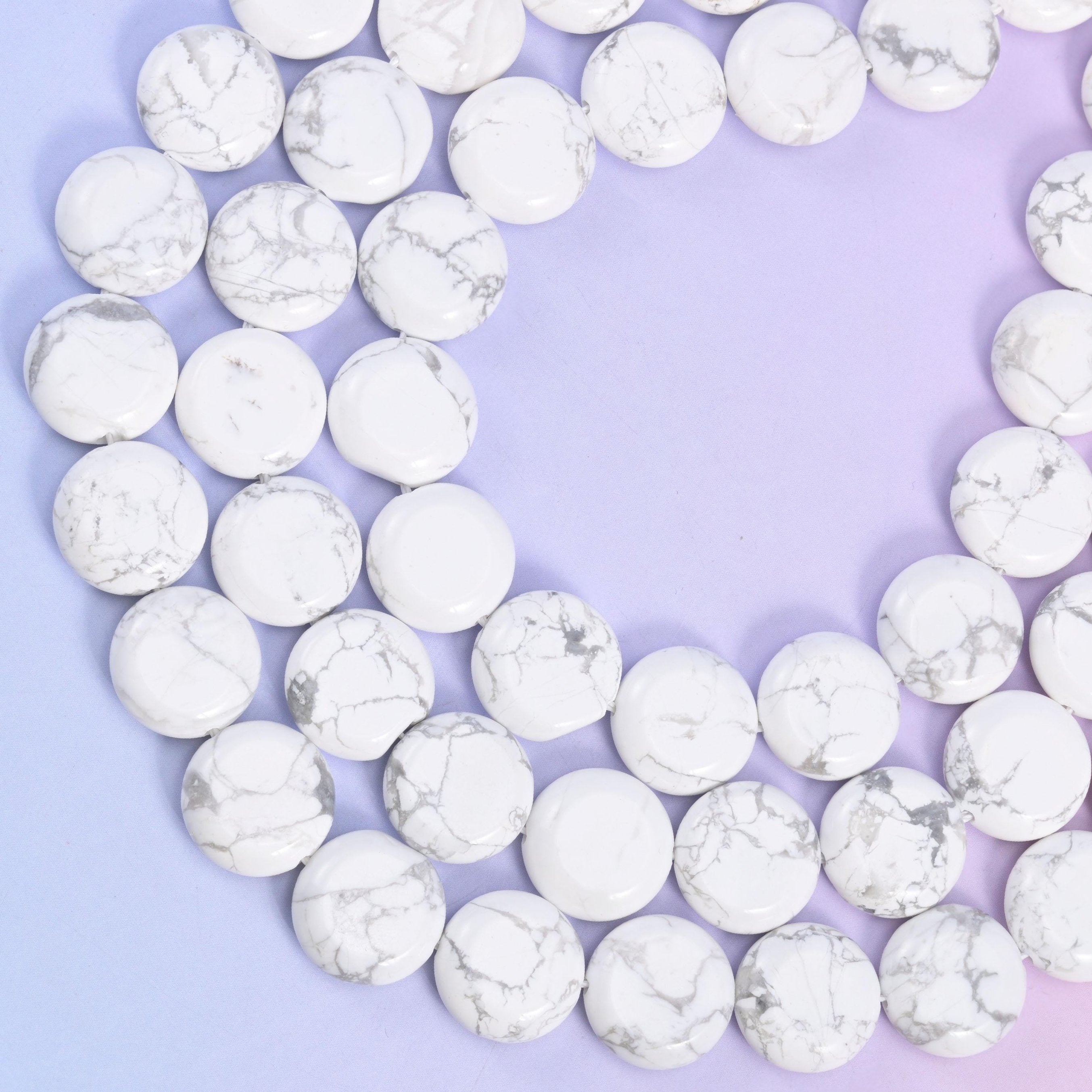 White Howlite coin beads, approximately 26 beads per strand