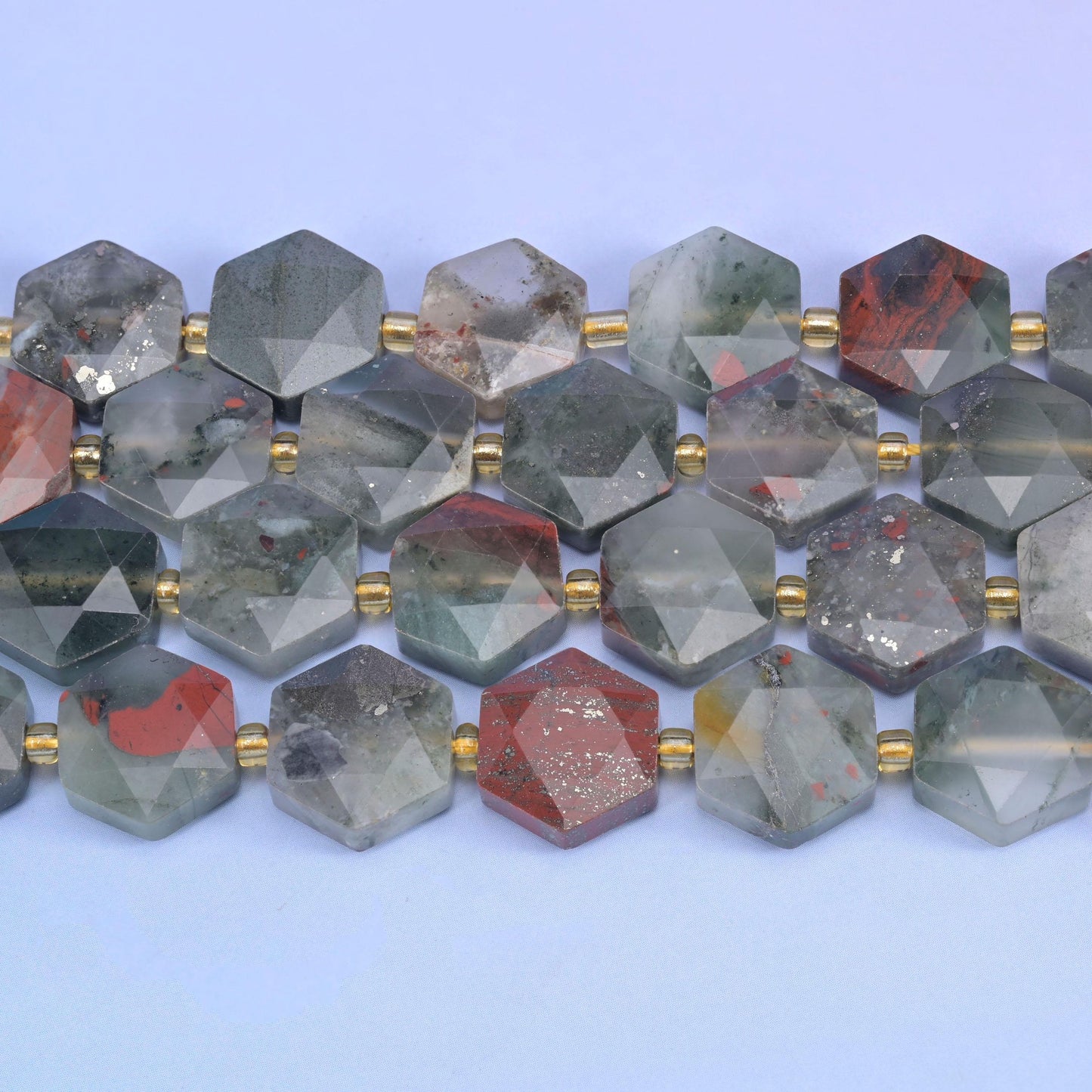 Rows of 12mm Bloodstone hexagons separated by gold-tone spacer beads
