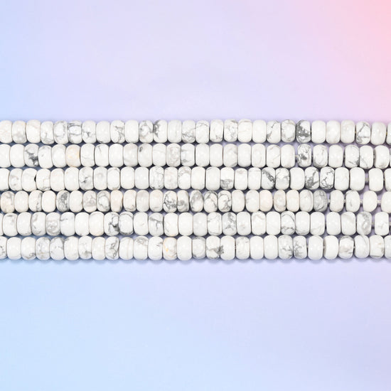 Natural White Howlite Rondelle Beads in soft white with gray marbled veining.