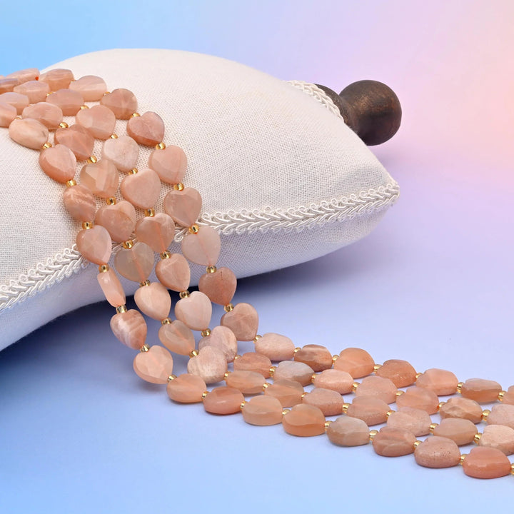 Natural Sunstone faceted heart beads, blush peach with a soft pearly sheen