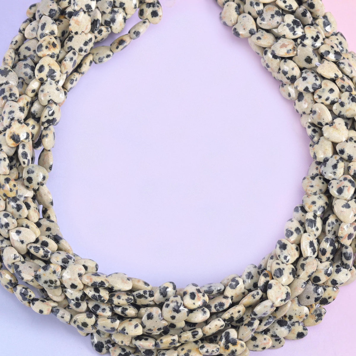 Dalmatian Jasper Heart Beads 6mm, small puffed hearts finished with a soft satin-smooth polish