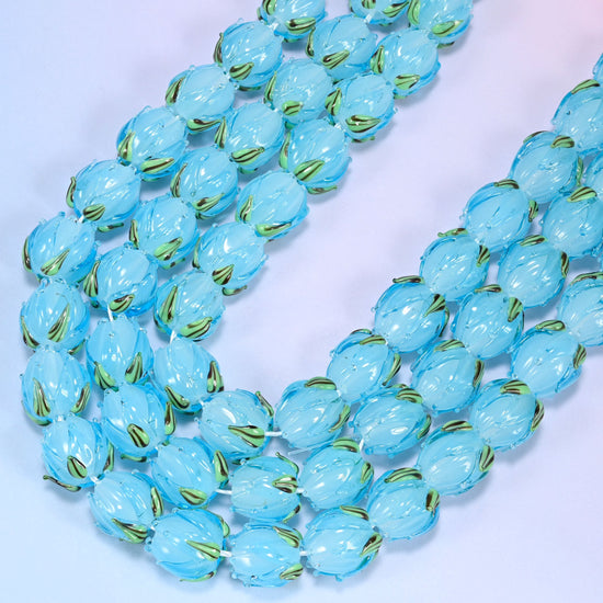 Sky blue tulip flower bud lampwork glass beads, 11 inch strand