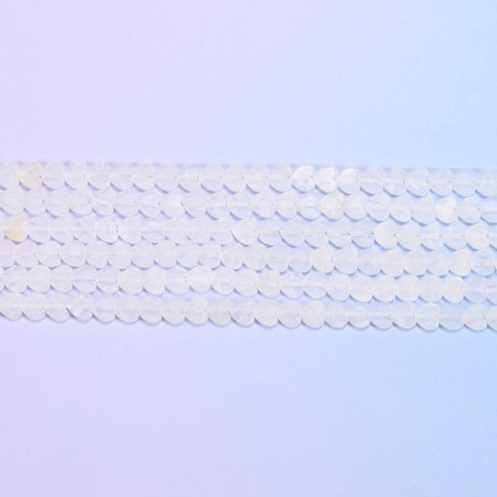 Clear quartz beads in frosted white with a soft sea-glass surface
