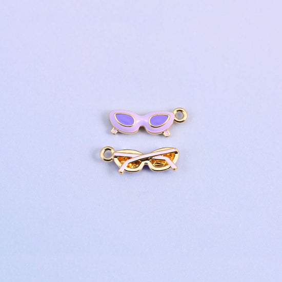 Light purple cat eye sunglasses charm with purple lenses, front and back.