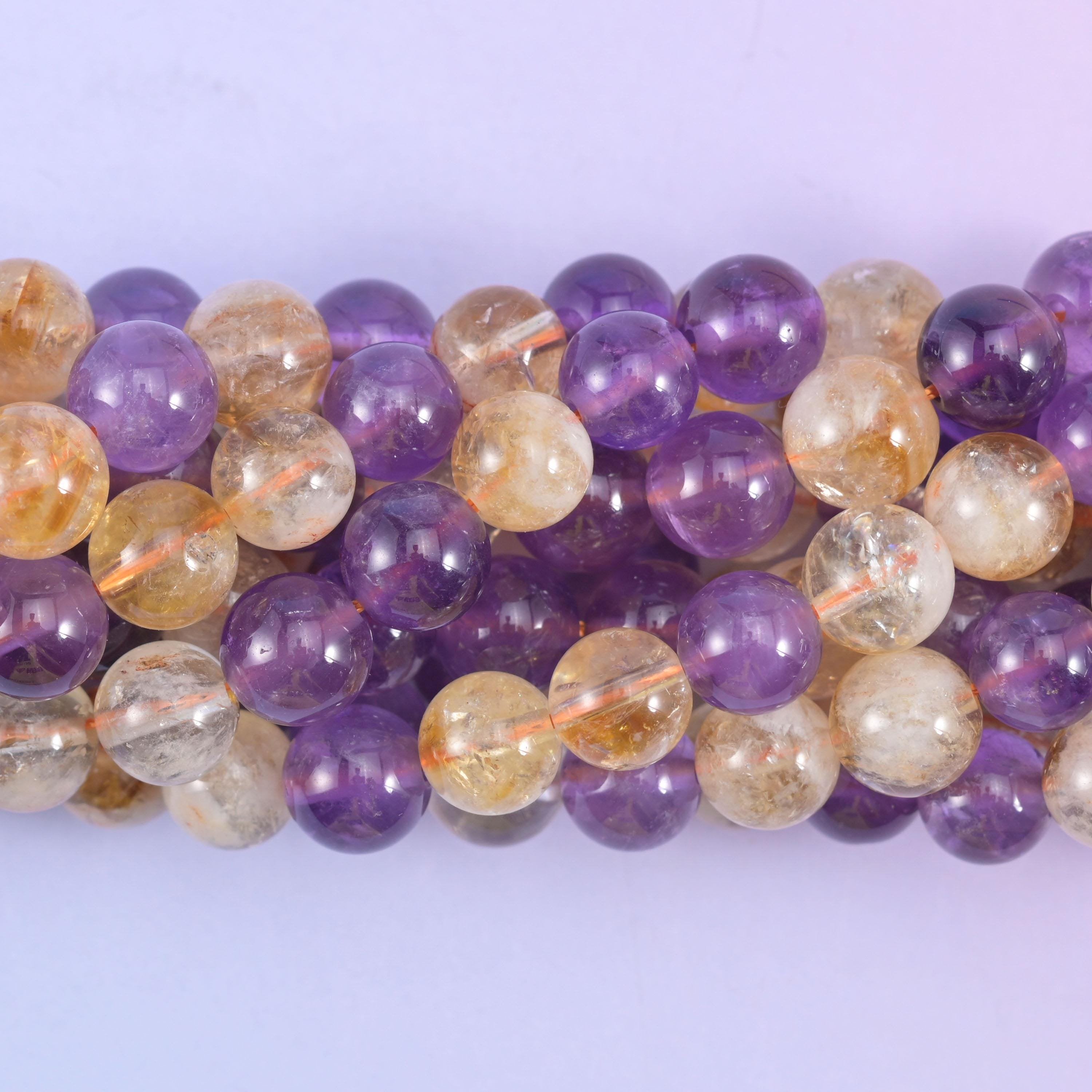 Smooth round cut amethyst and citrine beads