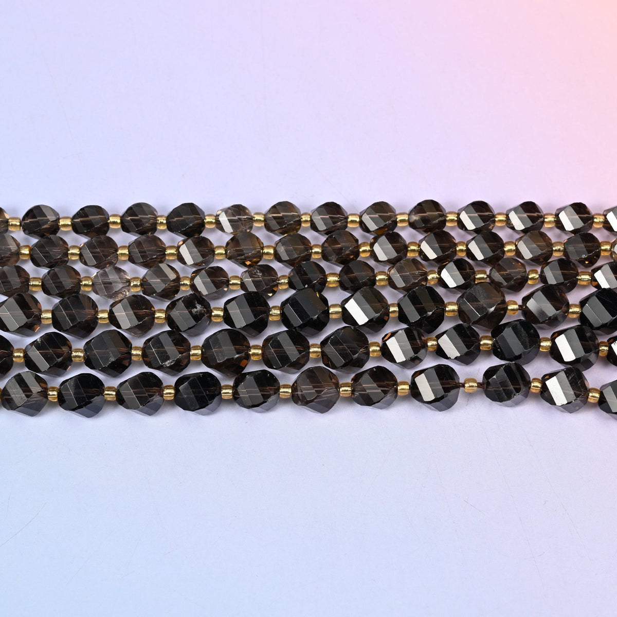 Smoky Quartz beads in translucent coffee brown deepening to near-black