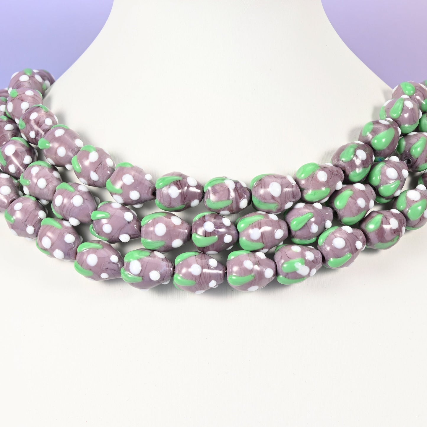 Strawberry glass beads, purple with white dots, approximately 15.5x12mm