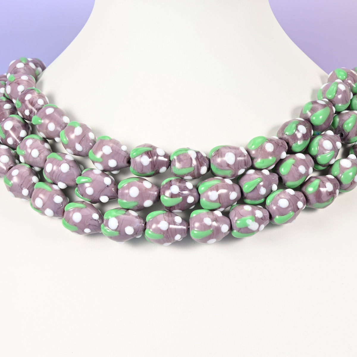Strawberry glass beads, purple with white dots, approximately 15.5x12mm