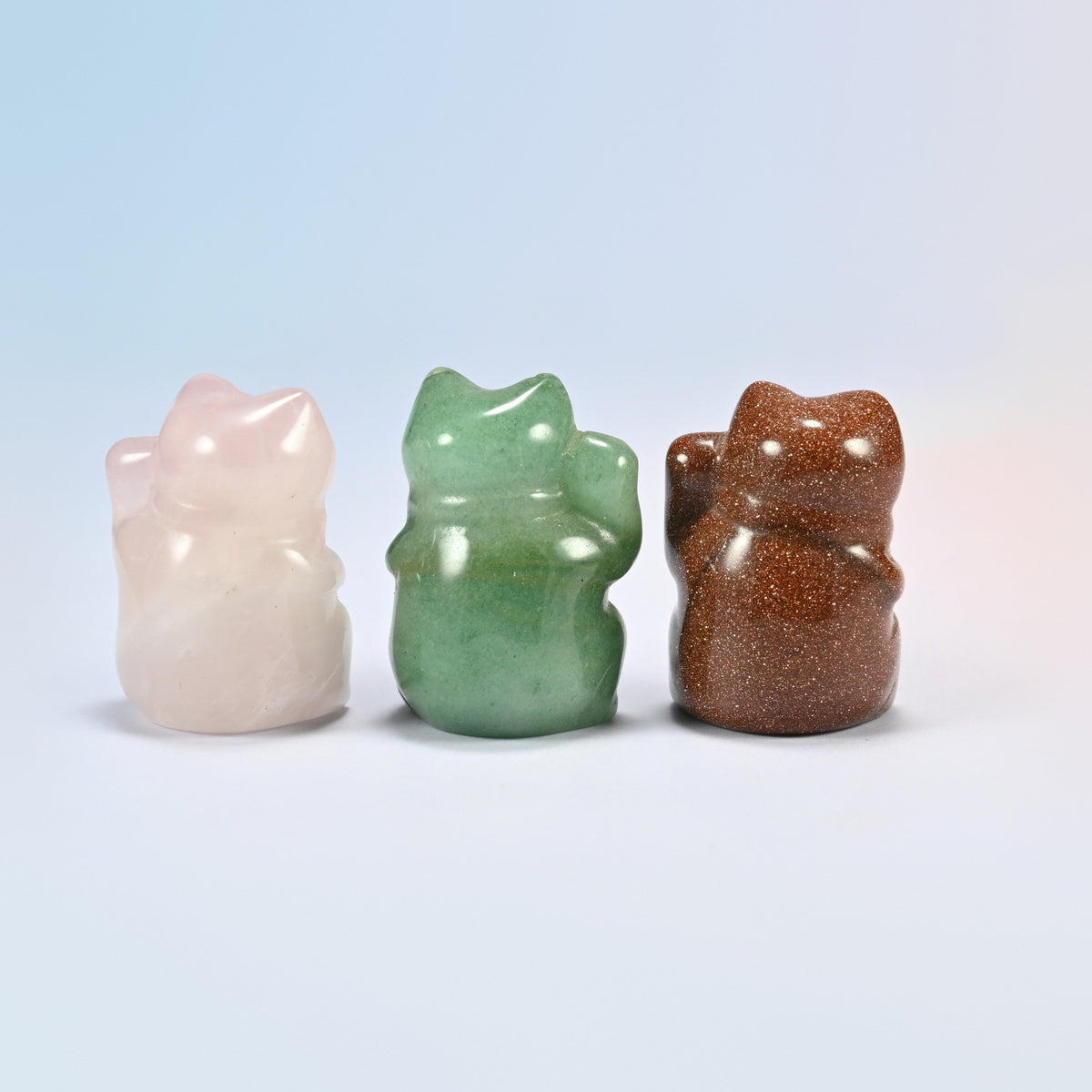Back view of rose quartz, green aventurine and gold sandstone lucky cats