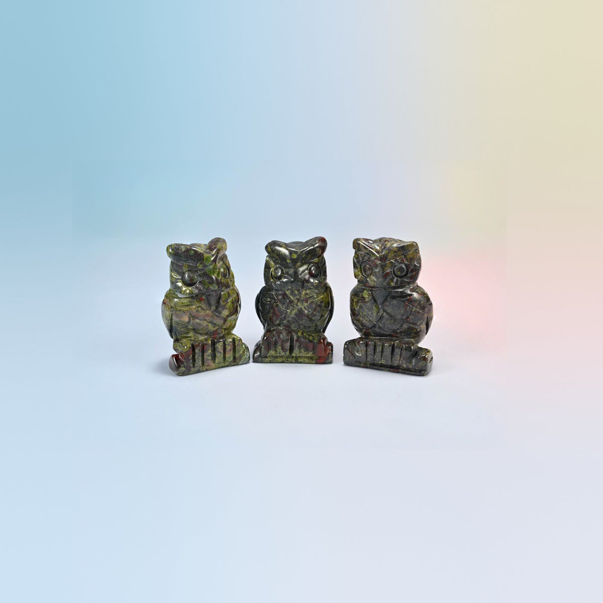 Owl crystal carving in dragon bloodstone, dark green natural stone with red patches