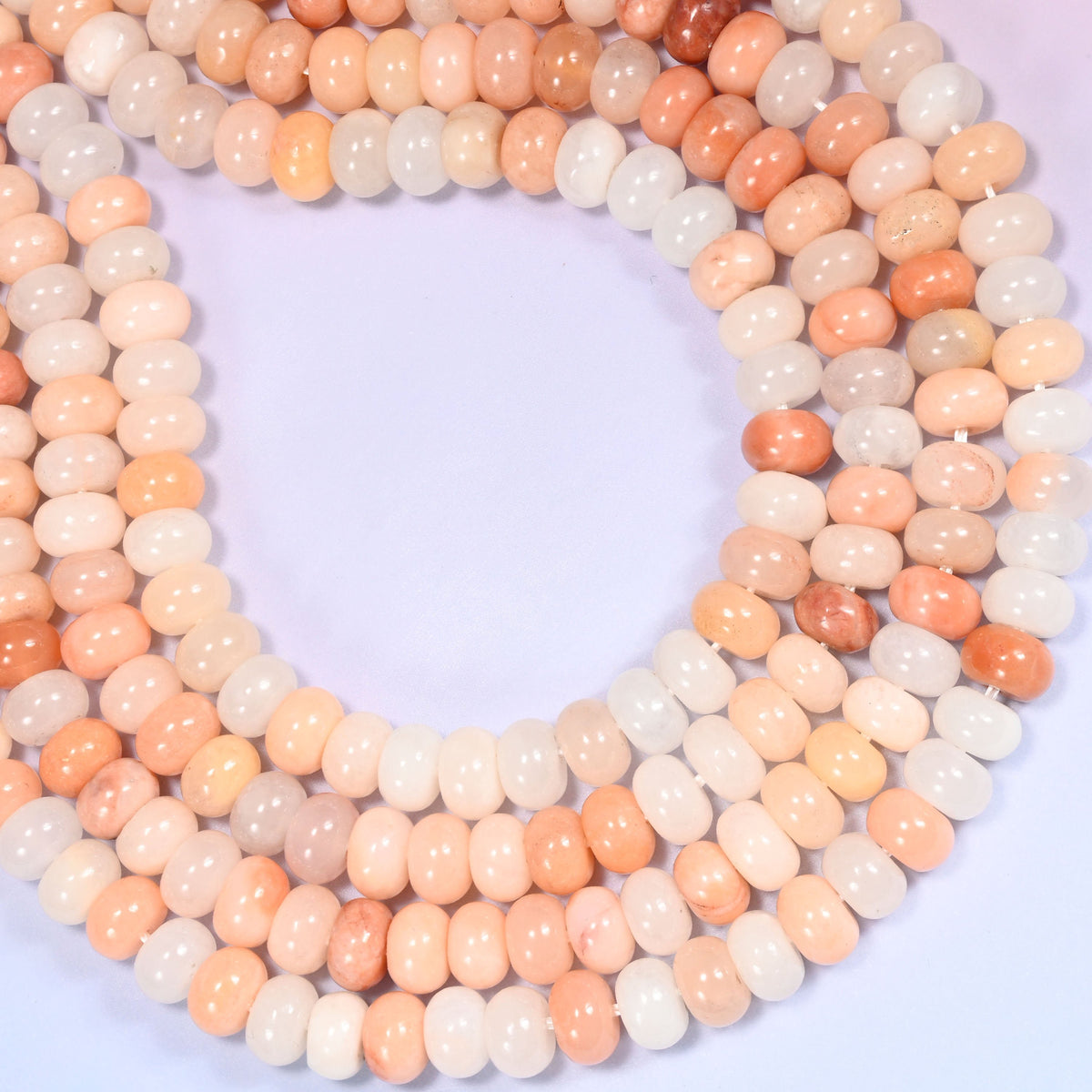 Natural Pink Aventurine Rondelle Beads with a large 2.5mm centrally drilled hole.