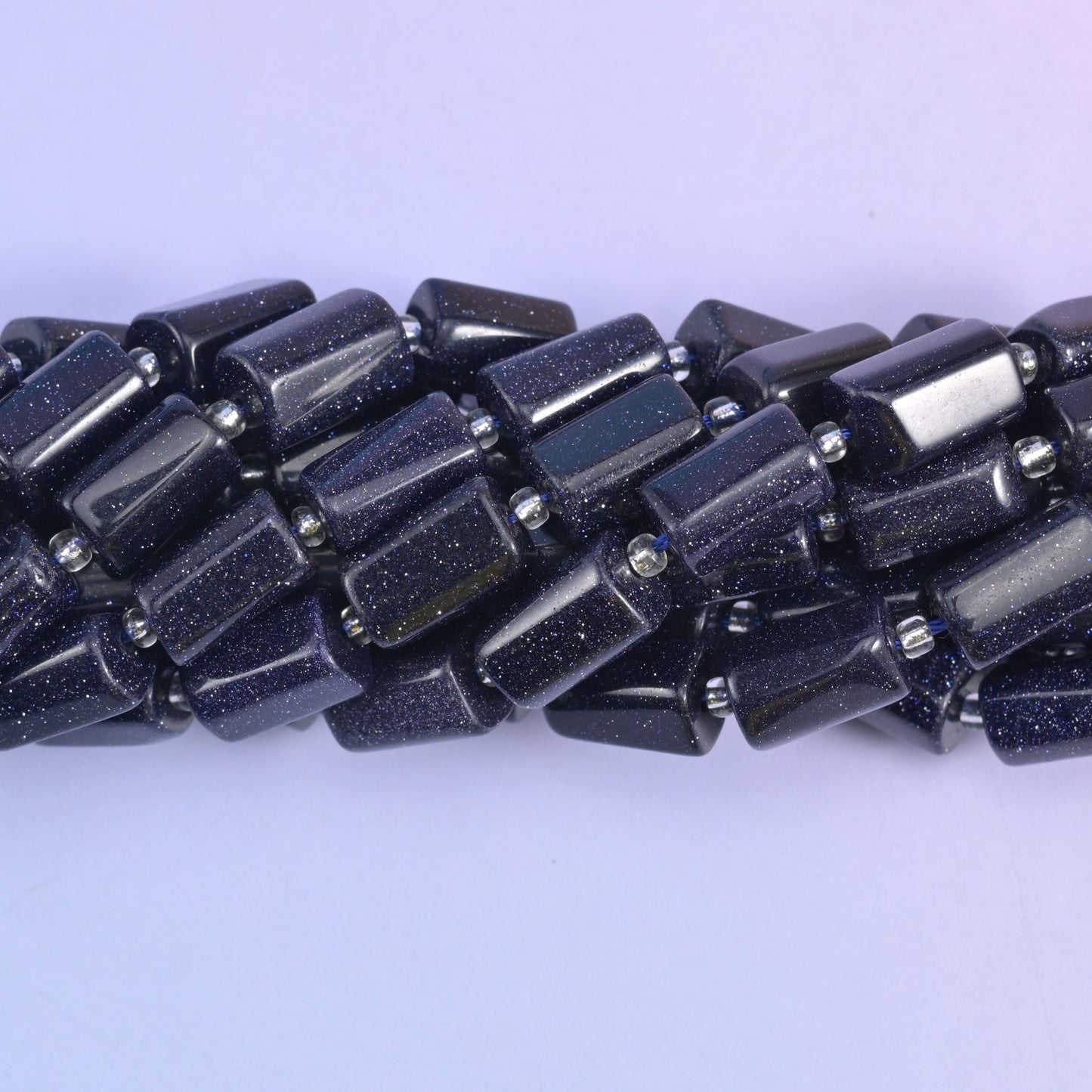 Faceted tube cylinder cut blue sandstone beads