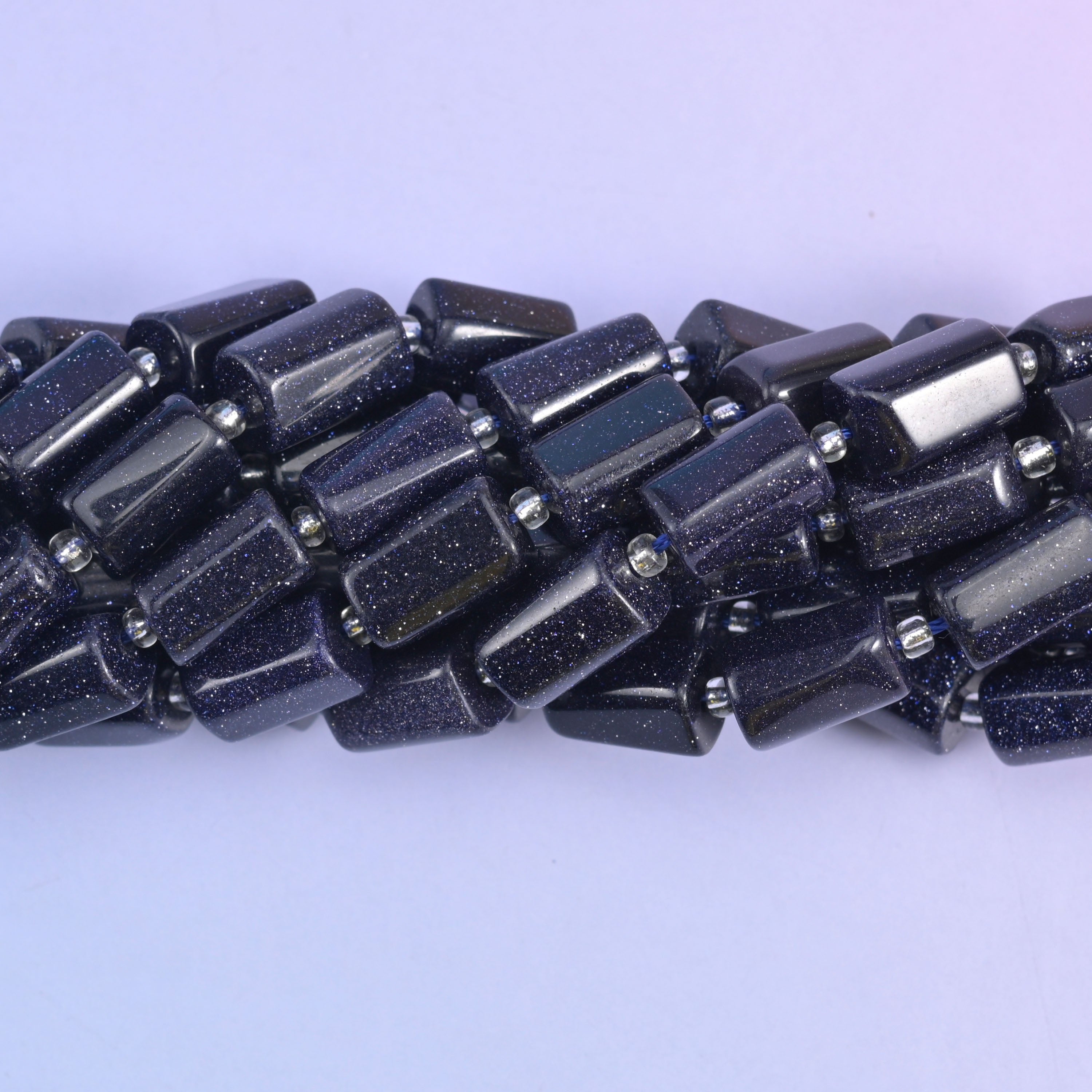 Faceted tube cylinder cut blue sandstone beads