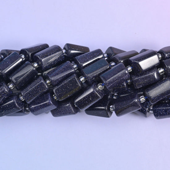 Faceted tube cylinder cut blue sandstone beads