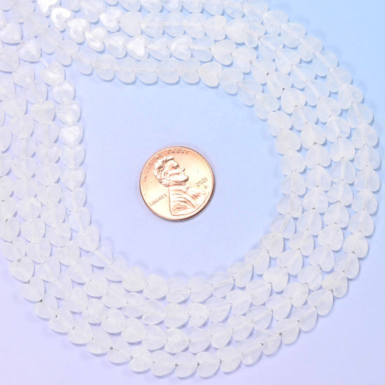 Matte clear quartz flat heart beads, approximately 68 per strand