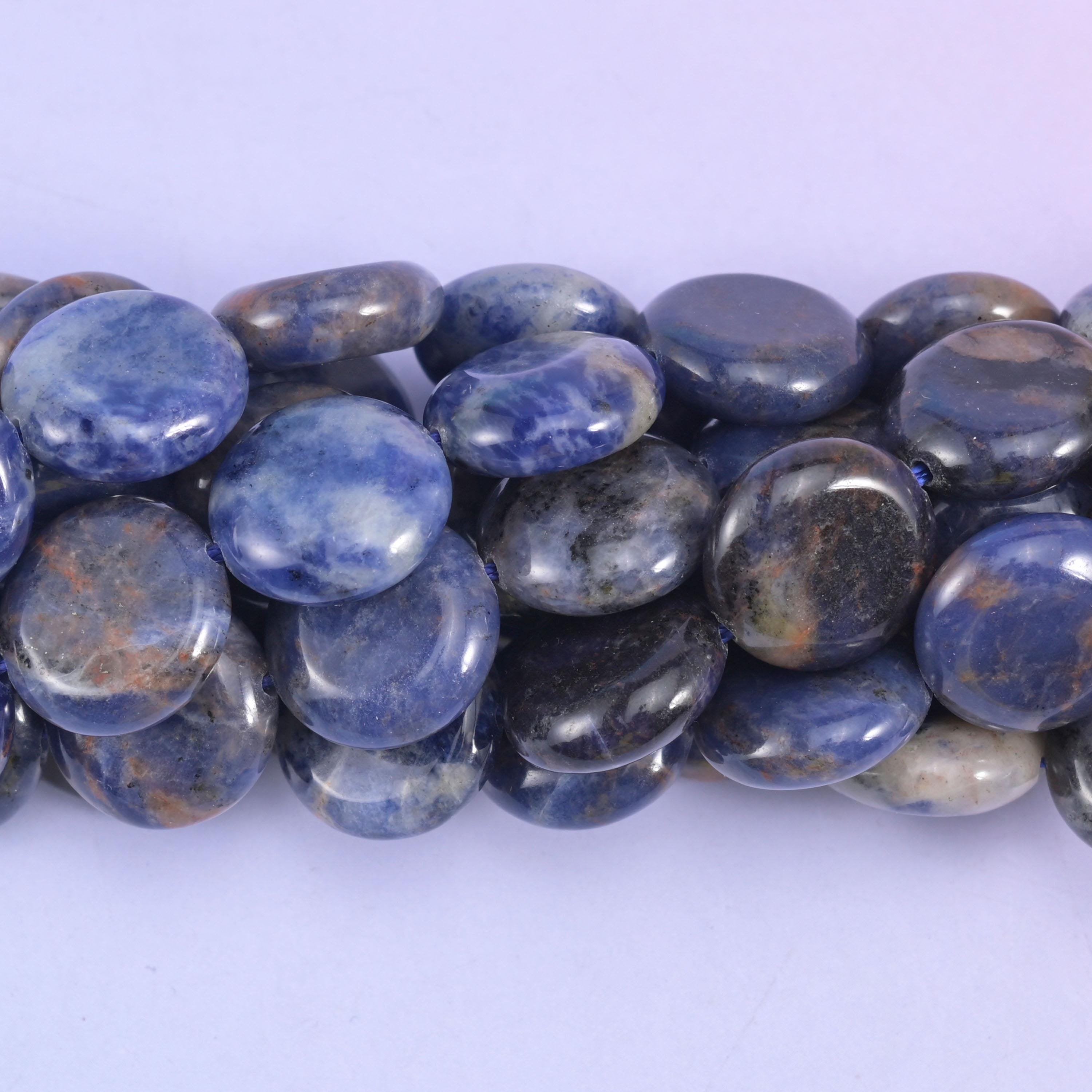 Coin cut Sodalite beads with a soft satin polish
