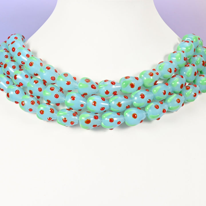 Strawberry glass beads, light blue with red dots, approximately 15.5x12mm