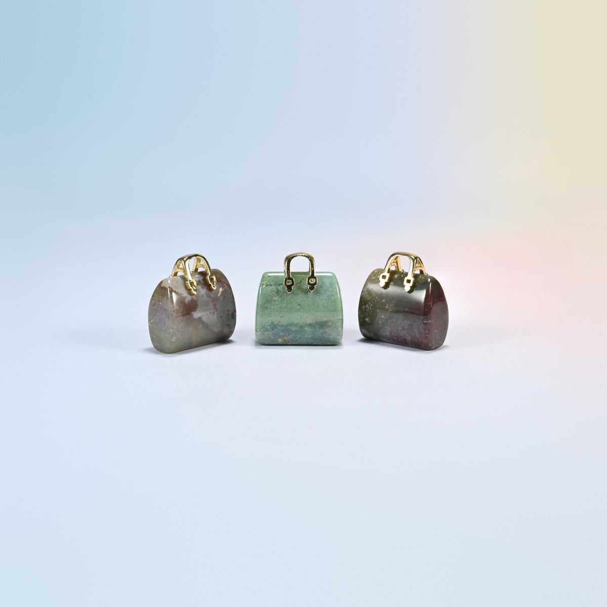 Three Indian agate purse crystal carvings, 1 inch, mixed gray, green and olive natural stone, gold-tone handle