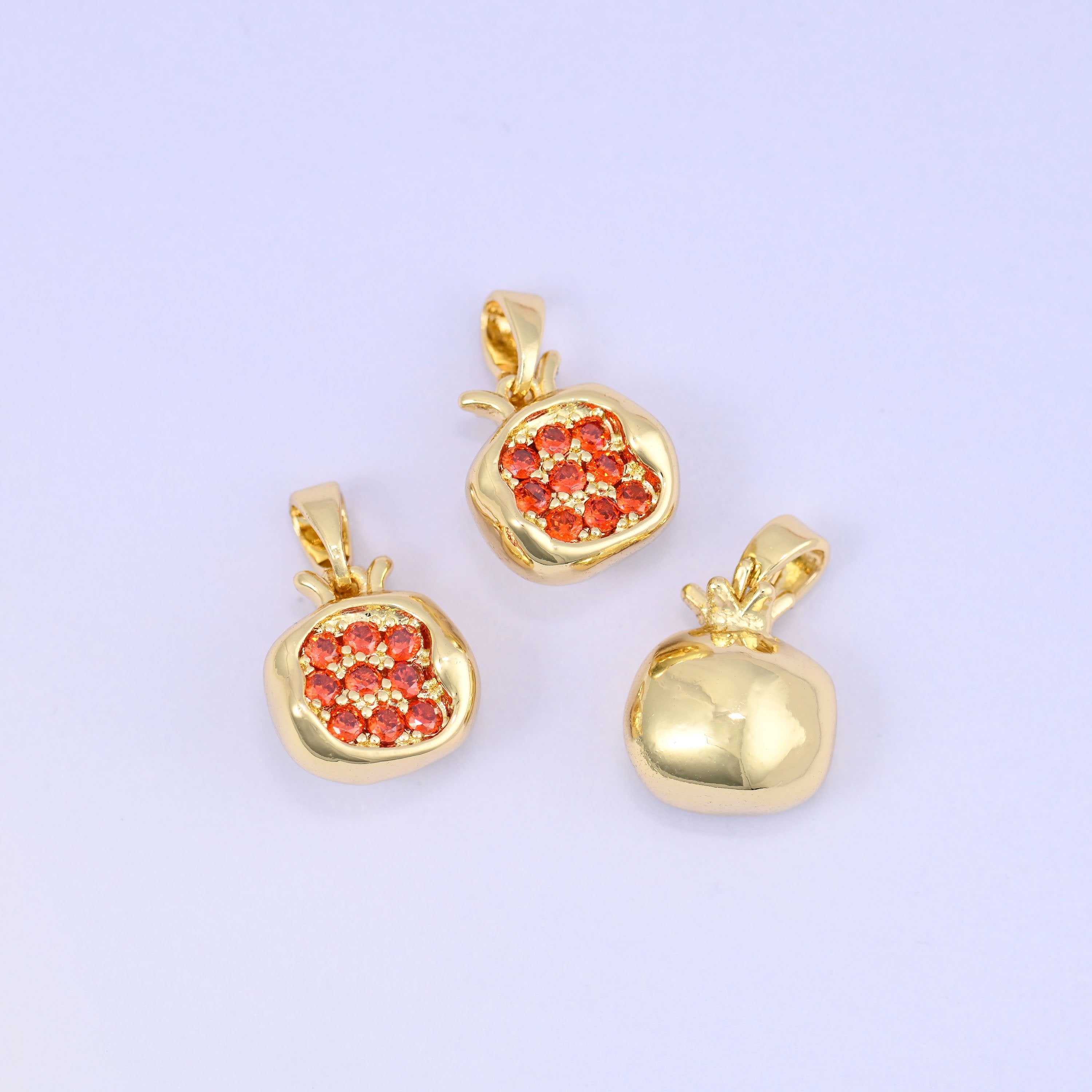 Brass half pomegranate charm with red zircon pave seed cluster