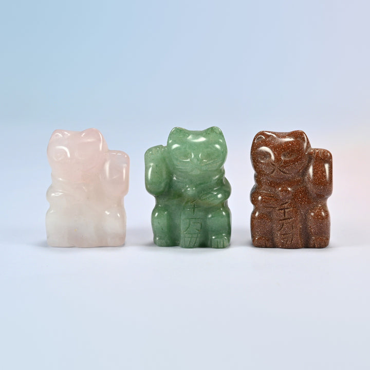 Three 1.5 inch lucky cat crystal carvings in natural rose quartz, natural green aventurine and gold sandstone (man-made glass)