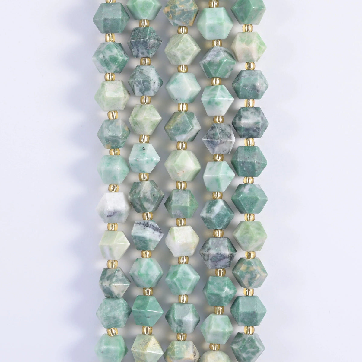 Faceted Diamond Cut Gemstone Beads, crisp faceted ridge catching a clean line of light.