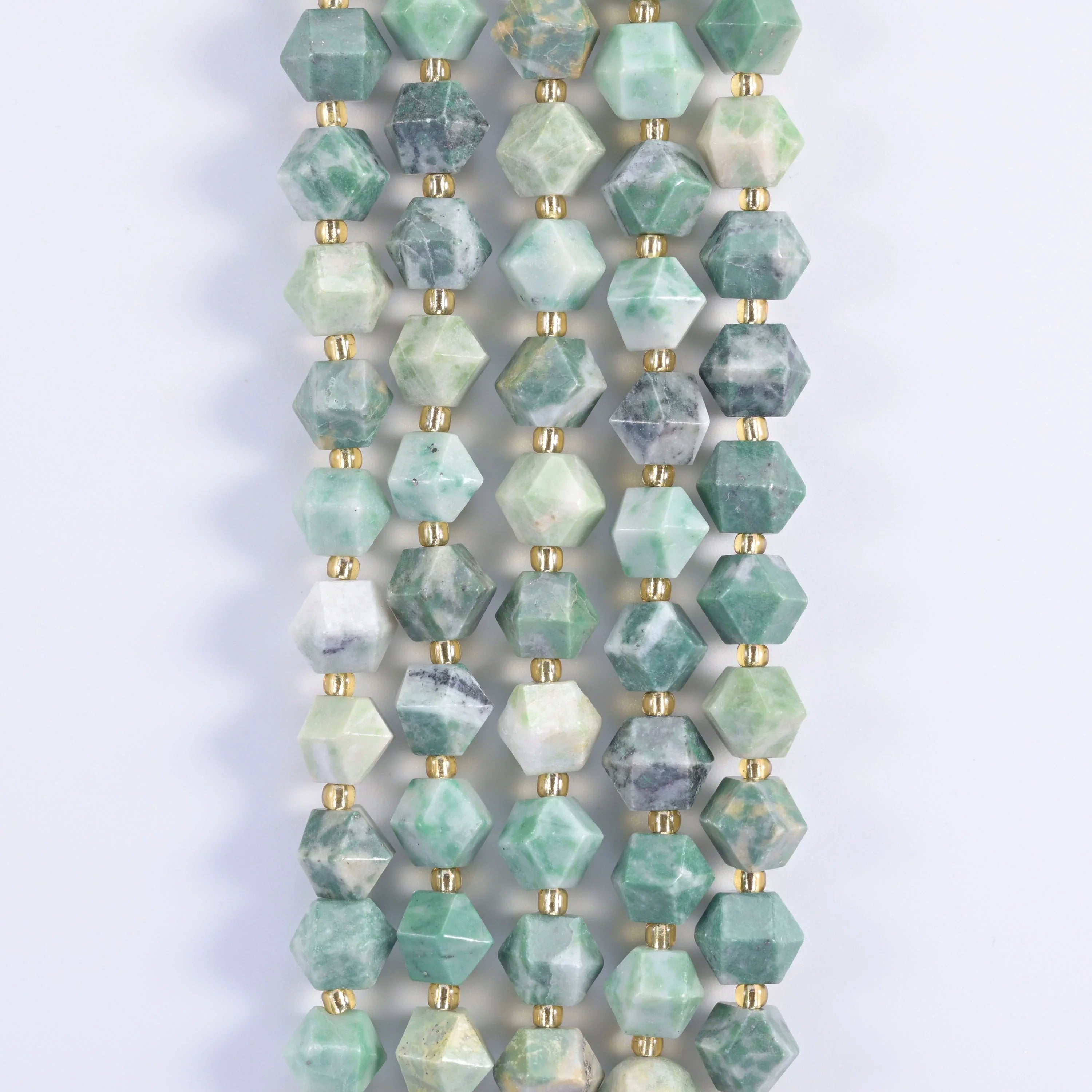Faceted Diamond Cut Gemstone Beads, crisp faceted ridge catching a clean line of light.