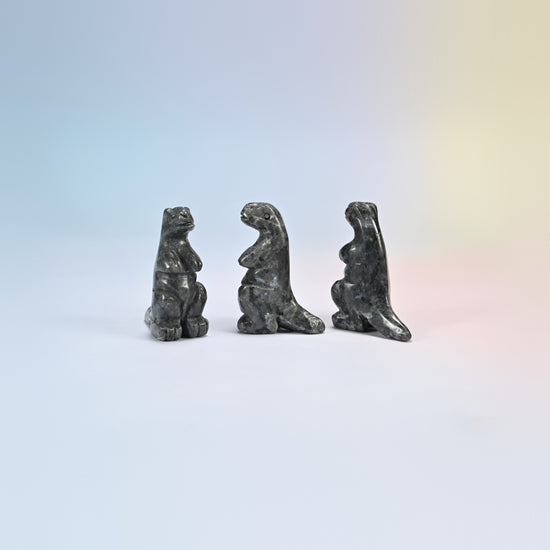 Three black labradorite T-Rex dinosaur crystal carvings, 2 inch, dark gray natural stone with light flecks