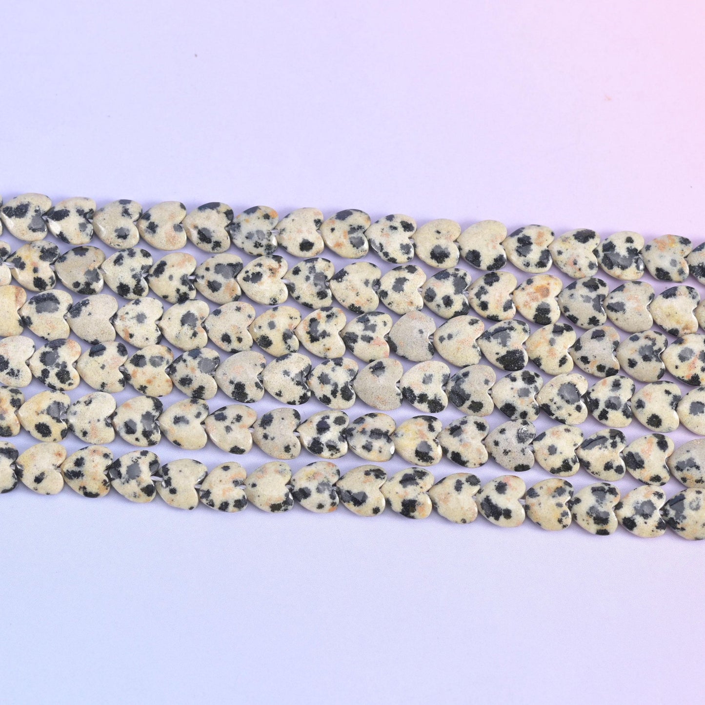 Dalmatian Jasper Heart Beads in cream to oatmeal with black and brown spots