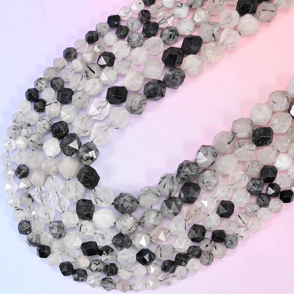 Black Rutilated Quartz diamond star cut beads, 15.5 inch strand.