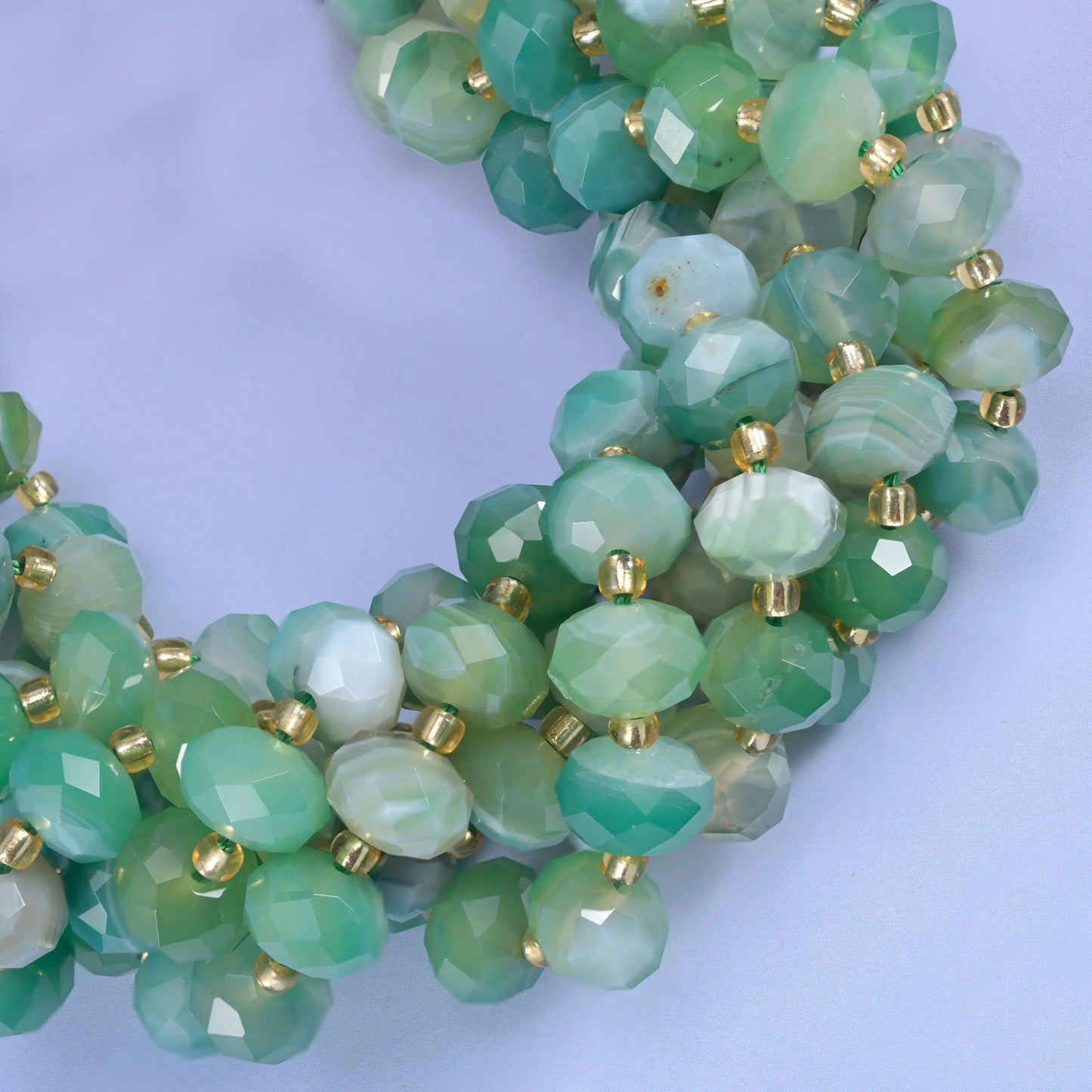 Faceted rondelle cut dyed green stripe agate beads
