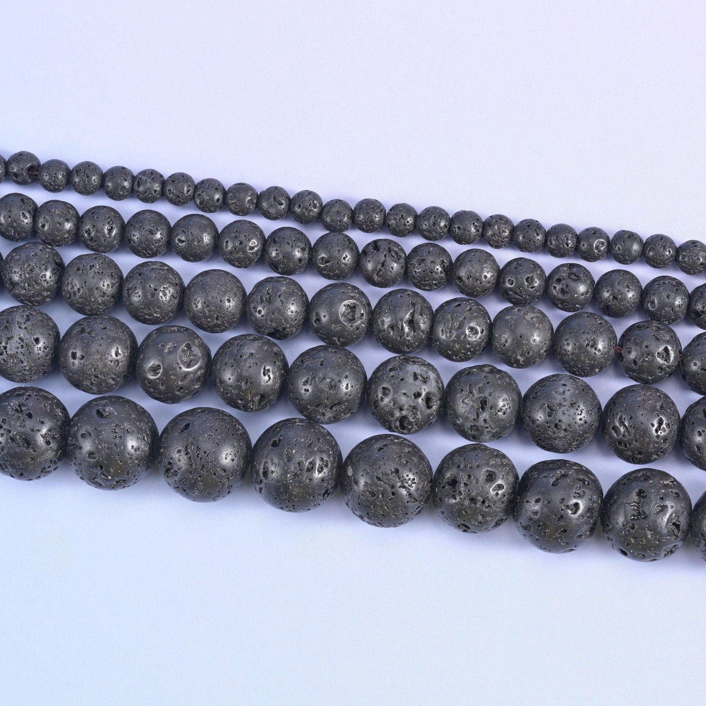 Lava rock round beads, centre-drilled hole approximately 1.0mm