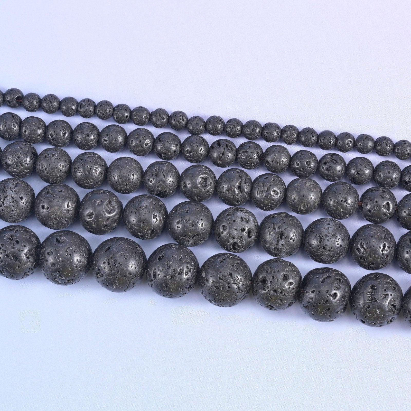 Lava rock round beads, centre-drilled hole approximately 1.0mm