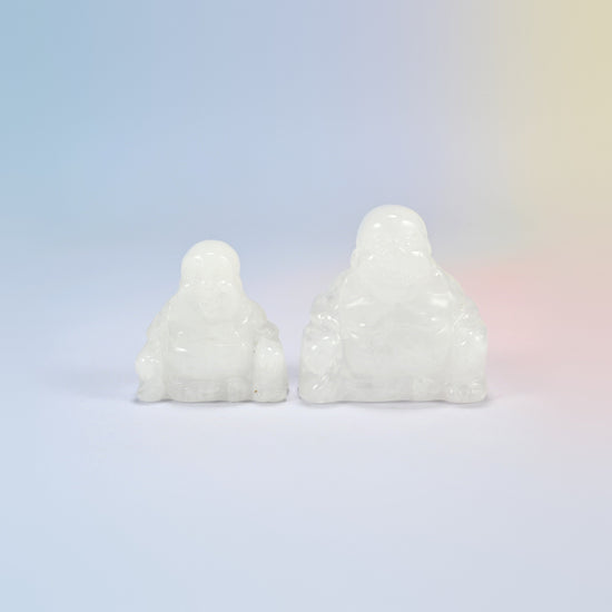 A 1.5 inch and a 2 inch clear quartz laughing Buddha crystal carving, milky clear natural stone