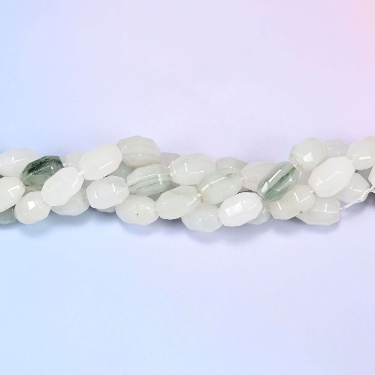 Natural Tianshan Jade Faceted Barrel Beads, full strand of approximately 28 beads.