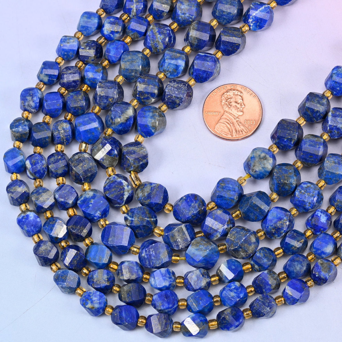 Faceted spiral twist cut natural lapis lazuli beads