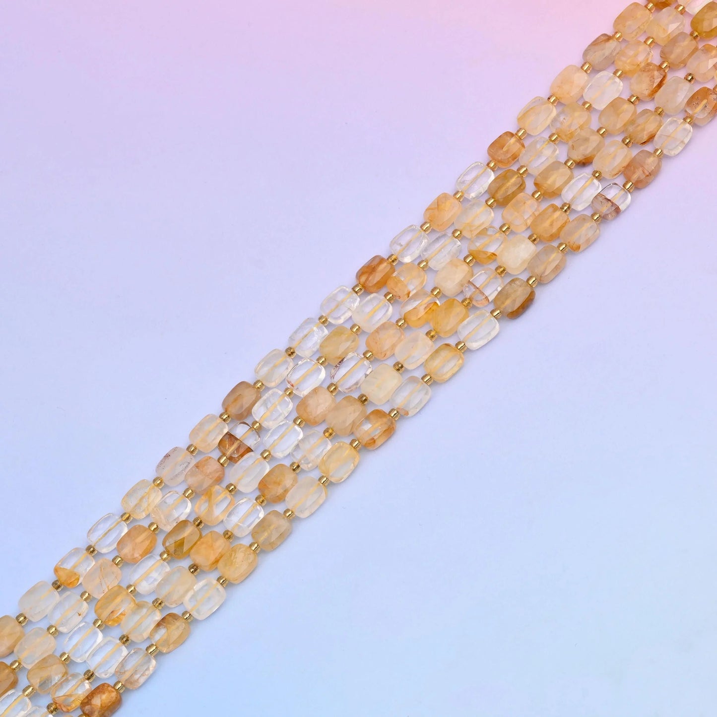 Golden healer quartz beads washed with warm honey and amber tones